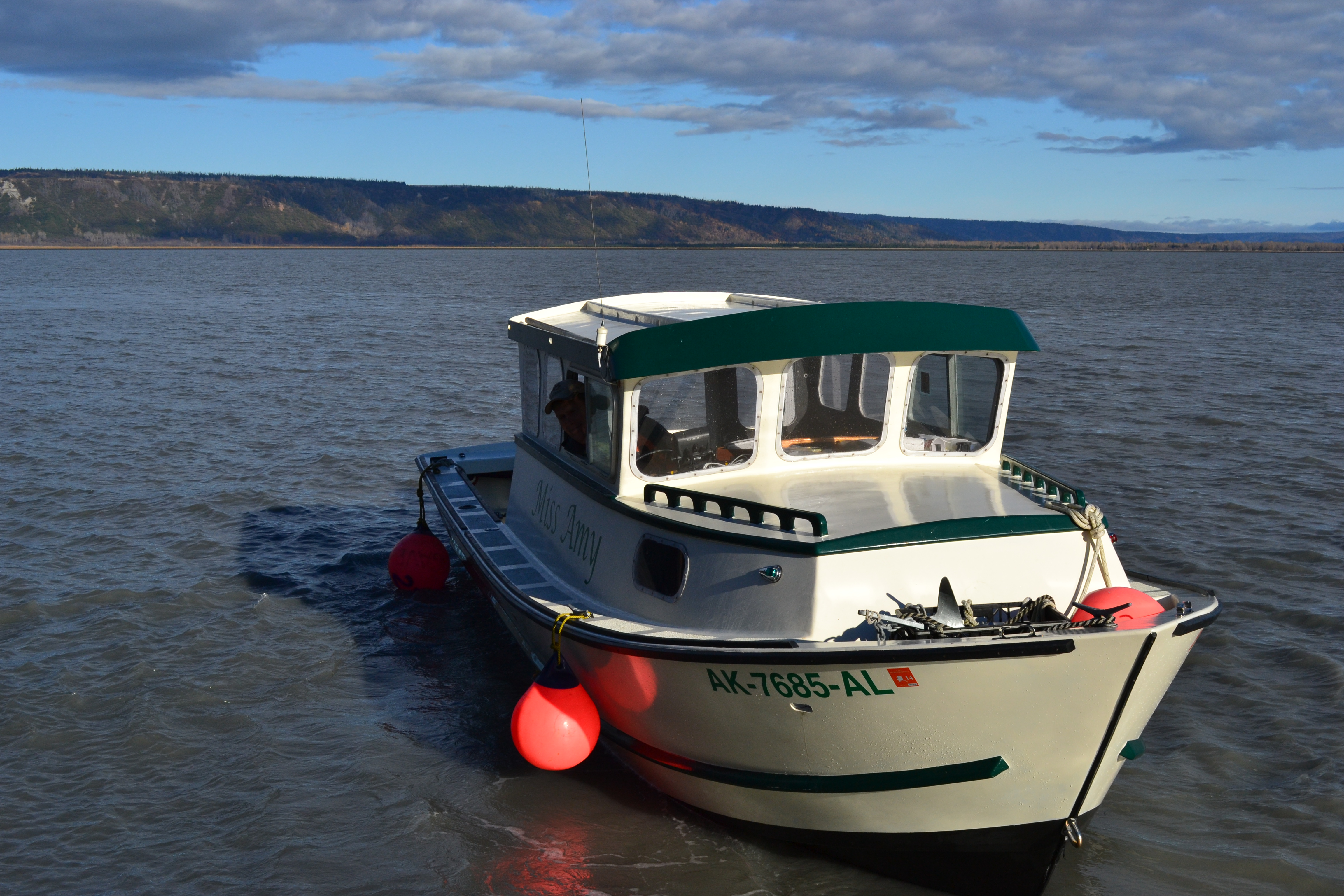 A boat leaving the dock